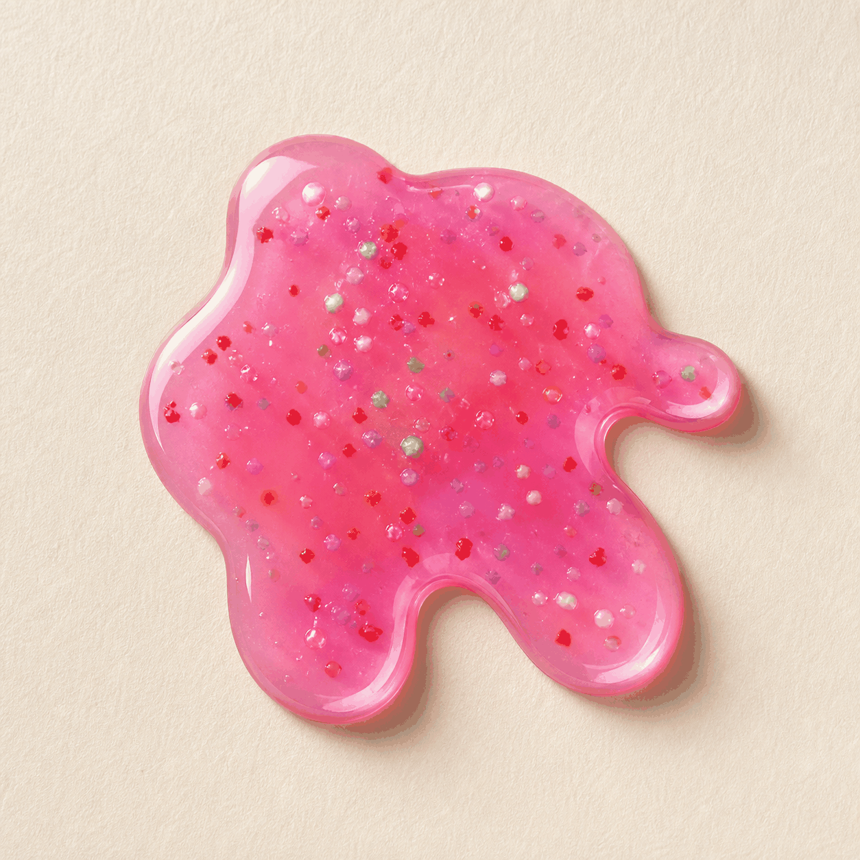 Real translucent pink resin with colorful confetti on ivory paper